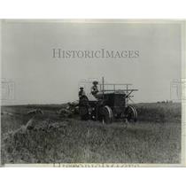 1939 Press Photo Bob and Lloyd Maeohtl'en harvesting their Wheat crop