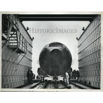 1962 Press Photo of a plane in an water tank test chamber. - nee18048