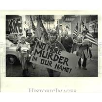 1984 Press Photo The protestors for Justice and Peace march around downtown