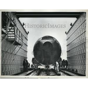 1962 Press Photo of a plane in an water tank test chamber. - nee18048