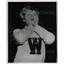 1963 Press Photo Waukegan cheerleader Ann Barnes carver