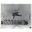 1963 Press Photo Detroit Fireman Jumping Barrels Skates - RRS84109