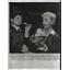1956 Press Photo Anna Marie Alberghetti offers ice cream to Richie Cromie