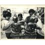1967 Press Photo People decorating statues of Buddha in Thailand - mjc15222