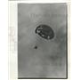 1966 Press Photo Parachutist Glides Toward Earth And Readies For The Landing