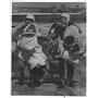 1970 Press Photo Skydivers Raymond Maguire, William Lau Carry Chutes After Jump