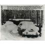 1958 Press Photo Hastings NY Roy Taylor age 11 clears snow from family car