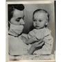 1948 Press Photo Infant Beverly Smith Insensitive to Pain, Nurse Helen Zimmerman