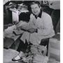 1955 Press Photo Liberace reading tons of mail from Ethiopia